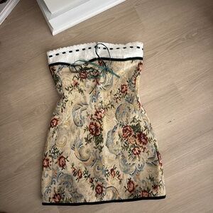 With Jean embroidered strapless dress.